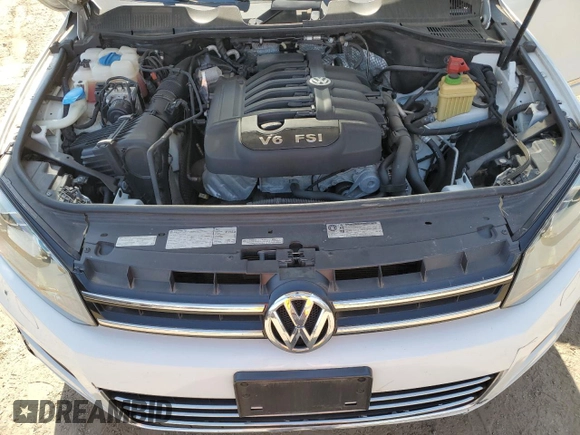 2012 Volkswagen Touareg Sport with VIN WVGEF9BP3CD011165, listed as a Copart auction lot 48913935 with 118,839 mi miles and Salvage Title. Bid and sale history available at DreamBid. Image 12.