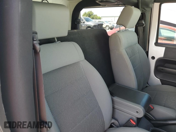2009 Jeep Wrangler Sahara with VIN 1J4FA54149L708183, listed as a Copart auction lot 65989125 with 133,436 mi miles and Salvage title. Bid and sale history available at DreamBid. Image 10.