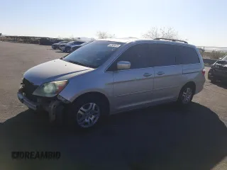 2005 Honda Odyssey EX-L z VIN 5FNRL38775B101272, wystawiony jako Copart lot #52589875 z przebiegiem 223 745 mil mil oraz Szkoda całkowita • Salvage title. Historia ofert i sprzedaży dostępna na DreamBid. Obrazek 1.