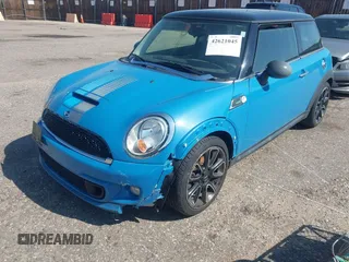 2012 MINI Hardtop S z VIN WMWSV3C55CTY29181, wystawiony jako IAAI lot #42621045 z przebiegiem 68 706 mil mil oraz . Historia ofert i sprzedaży dostępna na DreamBid. Obrazek 6.