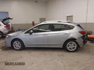 2017 Subaru Impreza Premium z VIN 4S3GTAB63H3705818, wystawiony jako IAAI lot #41568064 z przebiegiem 132 046 mil mil oraz . Historia ofert i sprzedaży dostępna na DreamBid. Obrazek 14.