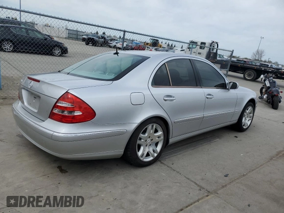 2003 Mercedes-Benz E-Class 5.0L with VIN WDBUF70J03A112909, listed as a Copart auction lot 49924865 with 158,244 mi miles and Salvage Title. Bid and sale history available at carsss.com. Image 3.