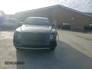 2019 Bentley Bentayga V8 z VIN SJAAM2ZV3KC027084, wystawiony jako Copart lot #45814705 z przebiegiem 38 490 mil mil oraz Szkoda całkowita • Salvage title. Historia ofert i sprzedaży dostępna na DreamBid. Obrazek 10.