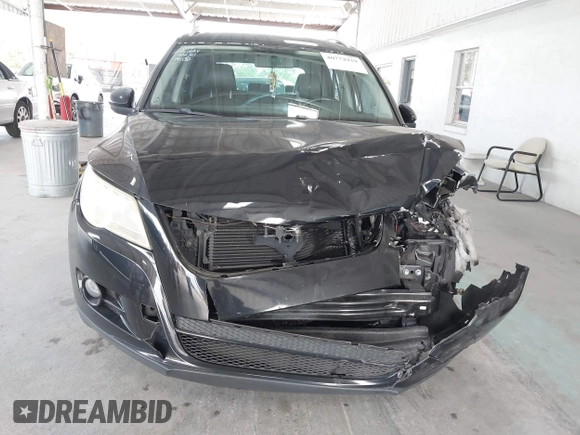 2011 Volkswagen Tiguan SE with VIN WVGAV7AX1BW549681, listed as a IAAI auction lot 40772939 with 157,547 mi miles and . Bid and sale history available at DreamBid. Image 12.