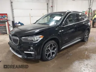 2018 BMW X1 xDrive28i with VIN WBXHT3C30J5K29383, listed as a IAAI auction lot 41503314 with 107,678 mi miles. Bid and sale history available at carsss.com. Image 17.
