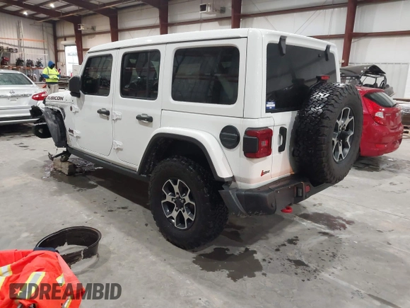2021 Jeep Wrangler Unlimited Rubicon with VIN 1C4HJXFN2MW809904, listed as a IAAI auction lot 41567956 with 34,000 mi miles and . Bid and sale history available at DreamBid. Image 3.
