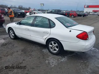 2002 Ford Taurus SES Standard with VIN 1FAFP55U12A184513, listed as a IAAI auction lot 41125306 with 241,896 mi miles. Bid and sale history available at carsss.com. Image 3.