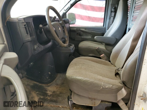 2011 Chevrolet Express Cargo z VIN 1GCZGTCG9B1186826, wystawiony jako Copart lot #82085794 z przebiegiem 202 697 mil mil oraz Nie do naprawy • Non repairable. Historia ofert i sprzedaży dostępna na DreamBid. Obrazek 7.