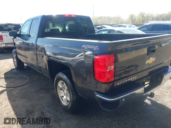 2015 Chevrolet Silverado 1500 LT with VIN 1GCVKREH4FZ256729, listed as a IAAI auction lot 41973711 with 185,791 mi miles. Bid and sale history available at carsss.com. Image 3.