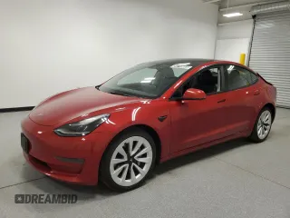 2023 Tesla Model 3 with VIN 5YJ3E1EA6PF455789, listed as a Copart auction lot 54715665 with 64,658 mi miles and Salvage Title. Bid and sale history available at DreamBid. Image 1.