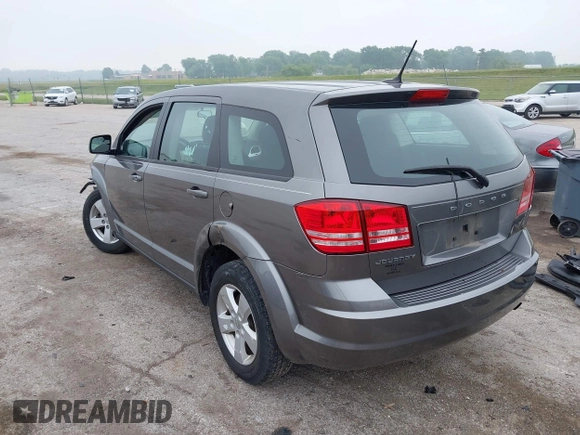 2013 Dodge Journey American Value with VIN 3C4PDCAB2DT645973, listed as a IAAI auction lot 42449402 with 133,000 mi miles and . Bid and sale history available at DreamBid. Image 3.
