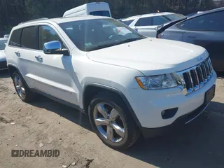 2011 Jeep Grand Cherokee Overland Summit with VIN 1J4RR6GT9BC546825, listed as a IAAI auction lot 42118789 with 123,449 mi miles. Bid and sale history available at carsss.com. Image 1.