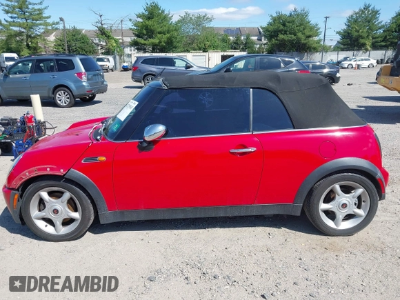 2005 MINI Convertible with VIN WMWRF33445TF62043, listed as a IAAI auction lot 42279363 with 173,067 mi miles and . Bid and sale history available at DreamBid. Image 14.