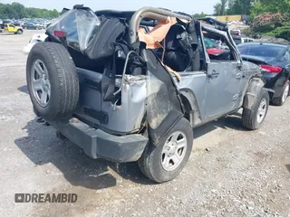 2014 Jeep Wrangler Sport with VIN 1C4AJWAG6EL192448, listed as a IAAI auction lot 42479738 with 44,848 mi miles and . Bid and sale history available at DreamBid. Image 4.