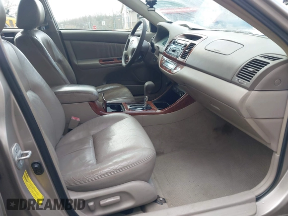 2003 Toyota Camry LE with VIN 4T1BE30K13U705105, listed as a IAAI auction lot 41696395 with 191,389 mi miles and . Bid and sale history available at DreamBid. Image 5.