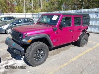 2024 Jeep Wrangler Sport S with VIN 1C4RJXN6XRW323881, listed as a IAAI auction lot 40543759 with 4,440 mi miles and . Bid and sale history available at DreamBid. Image 18.