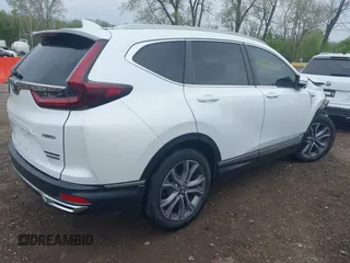 2020 Honda CR-V Touring with VIN 7FART6H9XLE024742, listed as a IAAI auction lot 42120164 with 32,213 mi miles and . Bid and sale history available at DreamBid. Image 4.