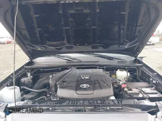 2013 Toyota Tacoma with VIN 3TMLU4ENXDM105967, listed as a IAAI auction lot 41819211 with 121,012 mi miles and . Bid and sale history available at DreamBid. Image 10.