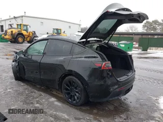 2023 Tesla Model Y Long Range with VIN 7SAYGDEE8PA183301, listed as a IAAI auction lot 41498769 with 82,893 mi miles and . Bid and sale history available at carsss.com. Image 3.