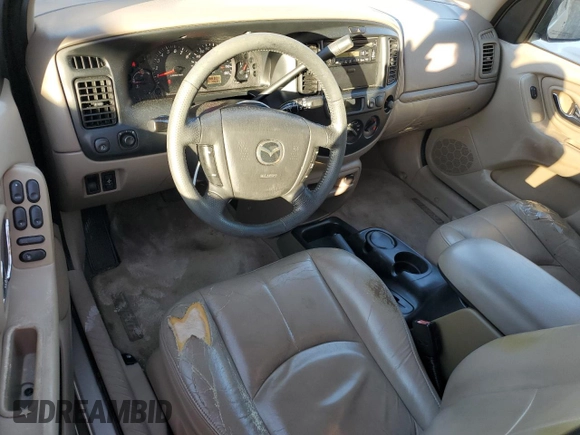 2002 Mazda Tribute LX with VIN 4F2YU091X2KM22268, listed as a Copart auction lot 82915484 with 70,684 mi miles and Clean Title. Bid and sale history available at carsss.com. Image 8.