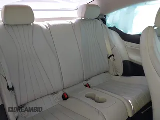 2018 Mercedes-Benz E-Class E 400 with VIN WDD1J6GB6JF020527, listed as a IAAI auction lot 37938951 with 62,697 mi miles. Bid and sale history available at carsss.com. Image 8.