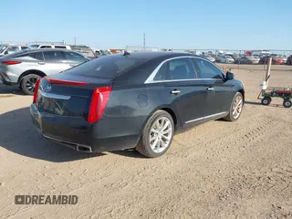 2014 Cadillac XTS Luxury with VIN 2G61M5S35E9228802, listed as a IAAI auction lot 42542501 with 106,506 mi miles and . Bid and sale history available at DreamBid. Image 4.
