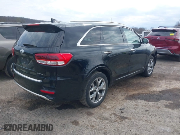 2016 Kia Sorento SX with VIN 5XYPKDA51GG073912, listed as a IAAI auction lot 42020501 with 172,836 mi miles. Bid and sale history available at carsss.com. Image 4.