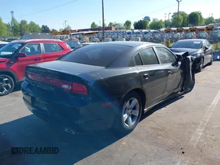 2012 Dodge Charger SE with VIN 2C3CDXBG7CH259867, listed as a IAAI auction lot 42046084 with 240,558 mi miles and . Bid and sale history available at DreamBid. Image 4.