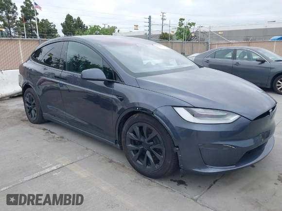 2022 Tesla Model X Plaid with VIN 7SAXCBE6XNF337687, listed as a IAAI auction lot 42035097 with 18,756 mi miles and . Bid and sale history available at DreamBid. Image 1.