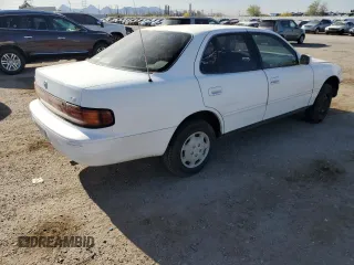 1992 Toyota Camry LE with VIN 4T1SK12E0NU064956, listed as a Copart auction lot 50665925 with 228,909 mi miles and Salvage Title. Bid and sale history available at carsss.com. Image 3.