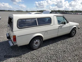 1983 Volkswagen Rabbit z VIN 1V1KG0170DV038002, wystawiony jako Copart lot #79815264 z przebiegiem 147 480 mil mil oraz Szkody całkowita. Historia ofert i sprzedaży dostępna na DreamBid. Obrazek 3.