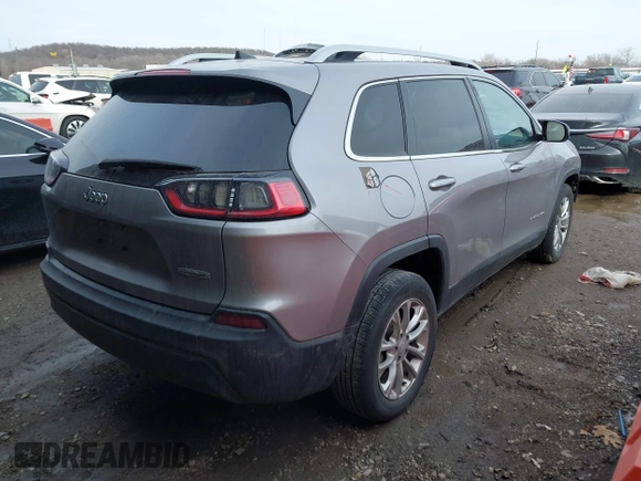 2019 Jeep Cherokee Latitude with VIN 1C4PJLCBXKD247676, listed as a IAAI auction lot 41598599 with 149,815 mi miles. Bid and sale history available at carsss.com. Image 4.