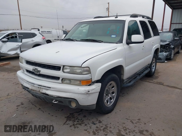 2002 Chevrolet Tahoe Z71 with VIN 1GNEK13Z22R303223, listed as a IAAI auction lot 41527148 with 211,835 mi miles. Bid and sale history available at carsss.com. Image 2.