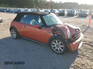 2007 MINI Convertible S with VIN WMWRH33587TJ43499, listed as a Copart auction lot 76266684 with 103,691 mi miles and Salvage title. Bid and sale history available at DreamBid. Image 4.
