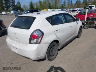 2010 Pontiac Vibe w/1SA with VIN 5Y2SP6E89AZ415272, listed as a IAAI auction lot 42036389 with 236,767 mi miles. Bid and sale history available at carsss.com. Image 4.