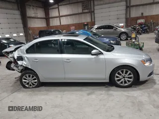 2014 Volkswagen Jetta Sedan SE w/Connectivity/Sunroof PZEV with VIN 3VWD17AJ9EM437804, listed as a IAAI auction lot 42026842 with 83,114 mi miles. Bid and sale history available at carsss.com. Image 13.