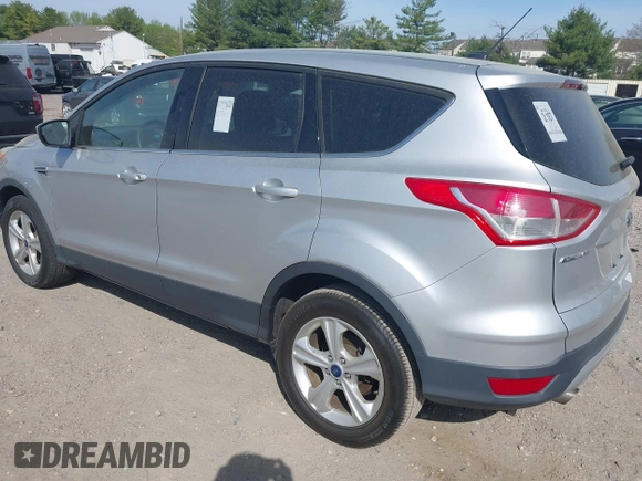 2015 Ford Escape SE with VIN 1FMCU9GX9FUC19545, listed as a IAAI auction lot 42128800 with 157,506 mi miles. Bid and sale history available at carsss.com. Image 3.