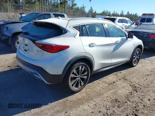 2018 Infiniti QX30 Luxury with VIN SJKCH5CR0JA056820, listed as a IAAI auction lot 40974821 with 71,902 mi miles and . Bid and sale history available at DreamBid. Image 4.