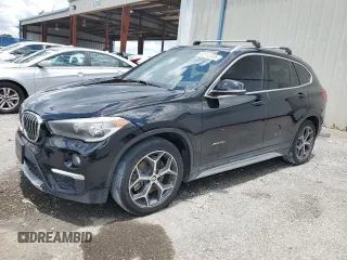 2016 BMW X1 xDrive28i z VIN WBXHT3C34G5E54952, wystawiony jako Copart lot #60713485 z przebiegiem 69 395 mil mil oraz Szkoda całkowita • Salvage title. Historia ofert i sprzedaży dostępna na DreamBid. Obrazek 1.
