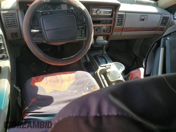 1995 Jeep Grand Cherokee Limited с VIN 1J4GZ78SXSC579786, выставлен на аукционе Copart как лот 72280424 с пробегом Не указан миль и На запчасти • Non repairable. История ставок и продаж доступна на DreamBid. Изображение 8.