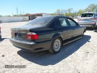2001 BMW 5 Series 530iA with VIN WBADT63421CF00607, listed as a IAAI auction lot 41780749 with 182,746 mi miles. Bid and sale history available at carsss.com. Image 4.