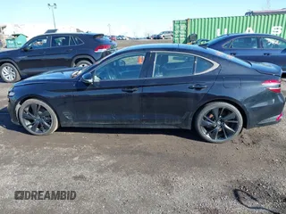2023 Genesis G70 2.0T z VIN KMTG34TA8PU110168, wystawiony jako IAAI lot #41924246 z przebiegiem 117 927 mil mil oraz . Historia ofert i sprzedaży dostępna na DreamBid. Obrazek 14.