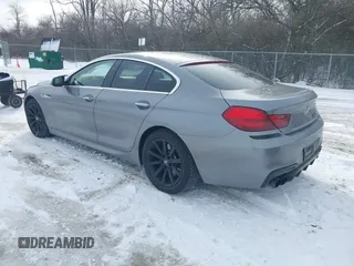2013 BMW 6 Series 650i xDrive with VIN WBA6B4C54DDG67543, listed as a IAAI auction lot 41607681 with 74,101 mi miles. Bid and sale history available at carsss.com. Image 3.
