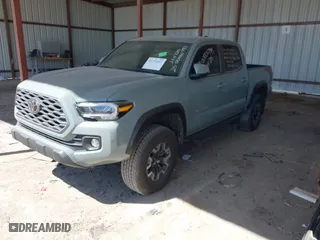 2023 Toyota Tacoma 4WD SR with VIN 3TMCZ5ANXPM613857, listed as a IAAI auction lot 41771957 with 76,232 mi miles. Bid and sale history available at carsss.com. Image 17.