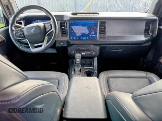 2022 Ford Bronco с VIN 1FMEE5DP3NLB62749, выставлен на аукционе Copart как лот 58267595 с пробегом 59 444 миль миль и Списание • Salvage title. История ставок и продаж доступна на DreamBid. Изображение 9.