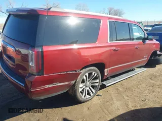 2018 GMC Yukon XL Denali with VIN 1GKS2HKJ3JR372473, listed as a IAAI auction lot 41637623 with 130,295 mi miles and . Bid and sale history available at DreamBid. Image 4.