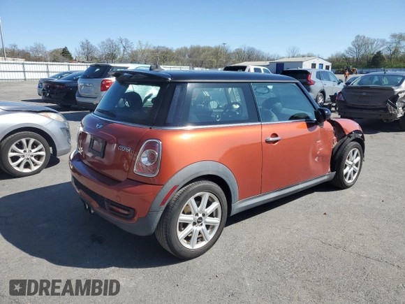 2011 MINI Hardtop S with VIN WMWSV3C57BTY11831, listed as a Copart auction lot 51985845 with 70,690 mi miles and Salvage Title. Bid and sale history available at DreamBid. Image 3.