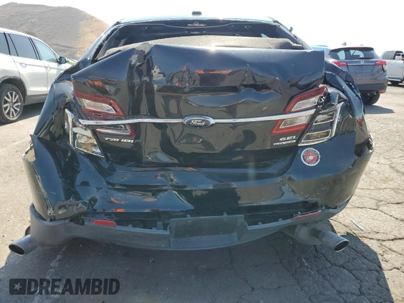 2015 Ford Taurus SEL with VIN 1FAHP2E86FG130511, listed as a Copart auction lot 60545805 with 99,215 mi miles and Salvage title. Bid and sale history available at DreamBid. Image 6.