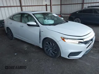2022 Honda Insight Touring with VIN 19XZE4F93NE004533, listed as a IAAI auction lot 41005286 with 70,521 mi miles and . Bid and sale history available at carsss.com. Image 1.