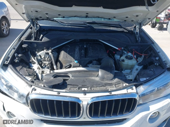 2016 BMW X5 xDrive35i with VIN 5UXKR0C56G0P34365, listed as a IAAI auction lot 41588869 with 105,250 mi miles. Bid and sale history available at carsss.com. Image 10.